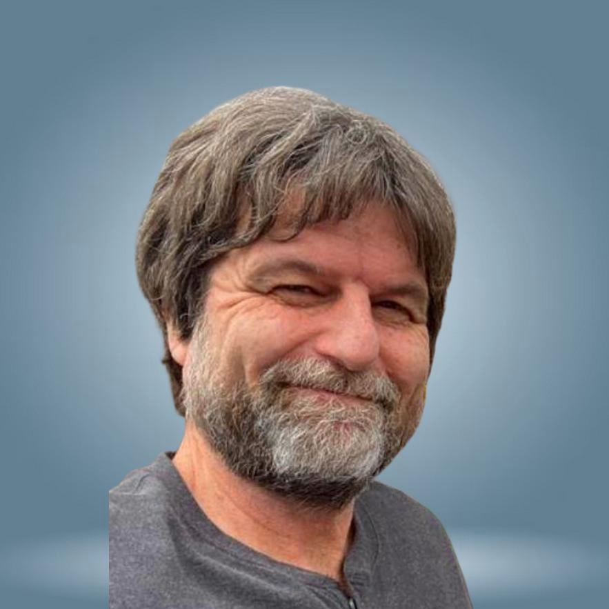 Headshot of Dr. Aaron Hughey