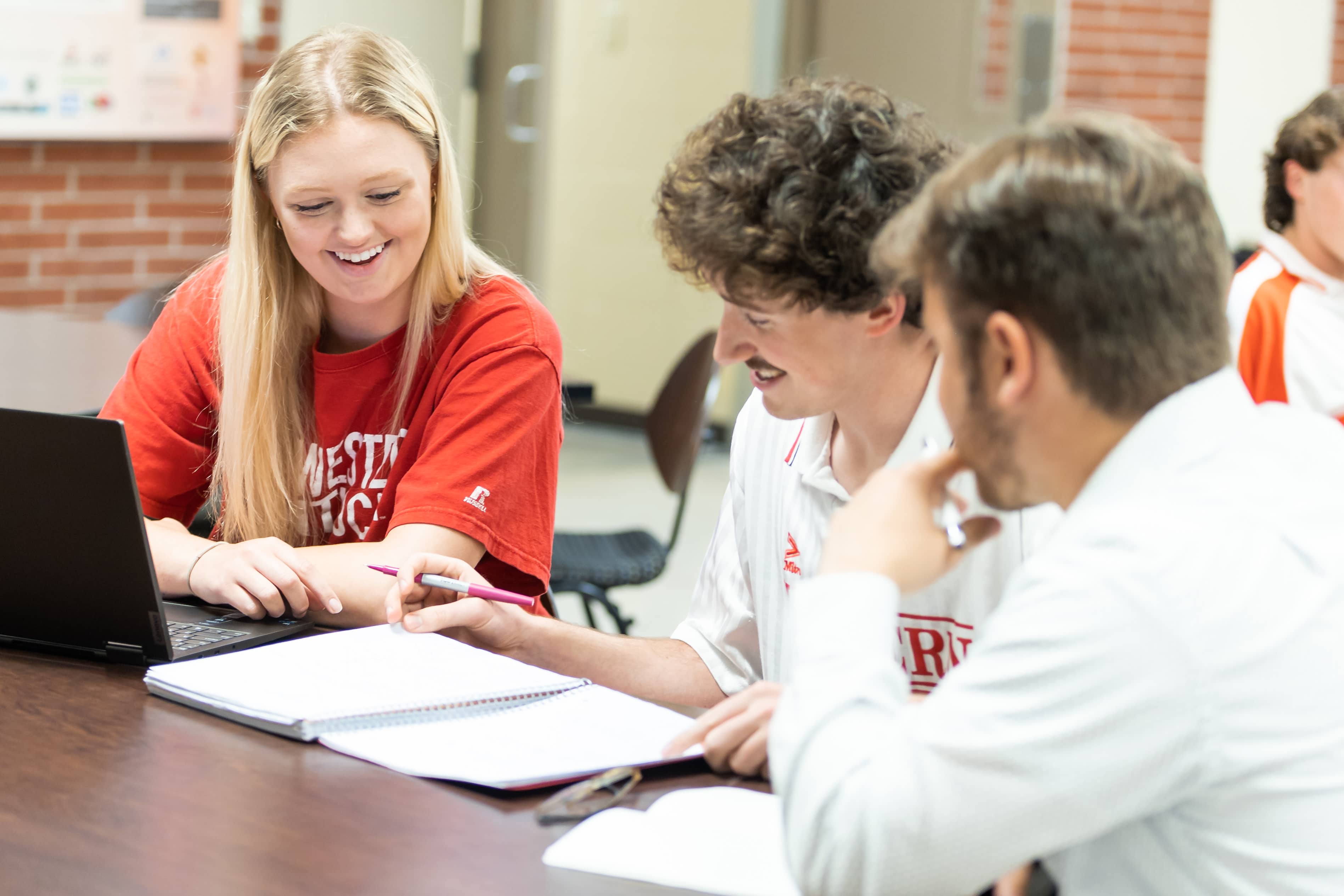 students smiling in Grise Hall