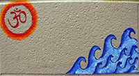 Photo of cinder block believed to be painted by Celena Allen, class of 2012; unpainted text 'Finding the Balance' 