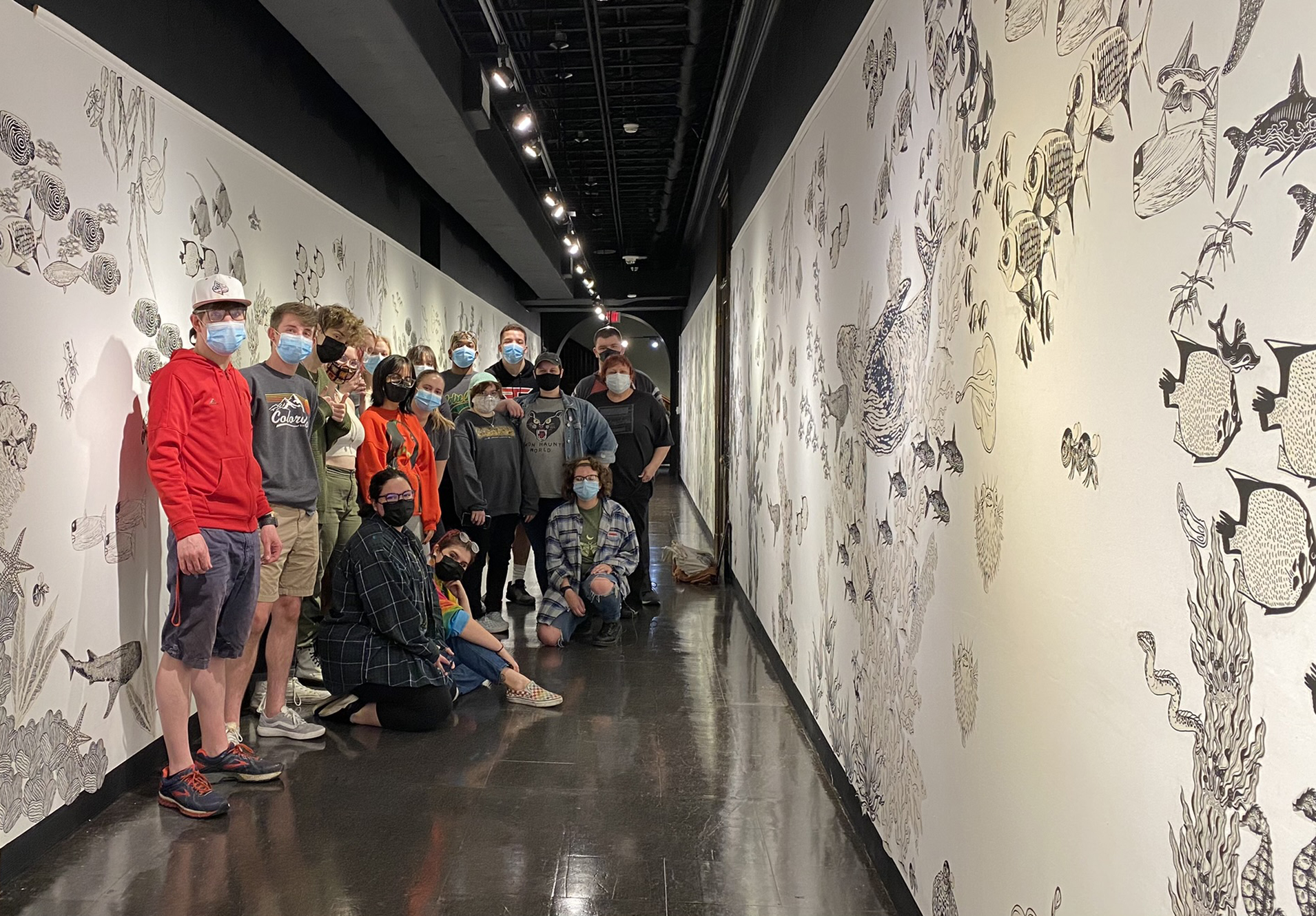 Students installing the exhibition
