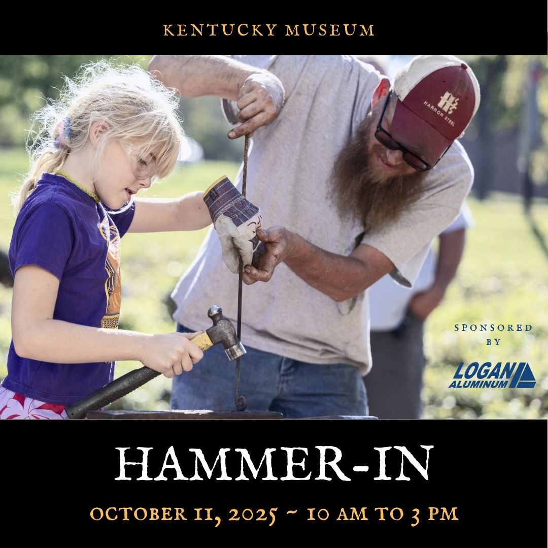Little girl holds a hammer while a blacksmith guides her hand in forging