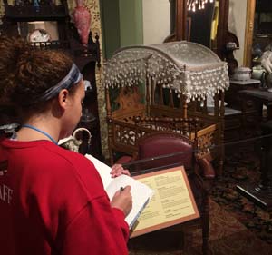WKU student sketching in the galleries