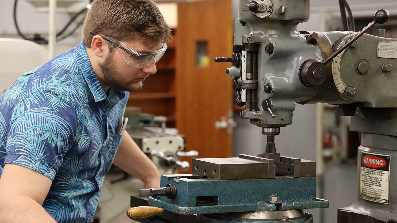 Student working on Machines