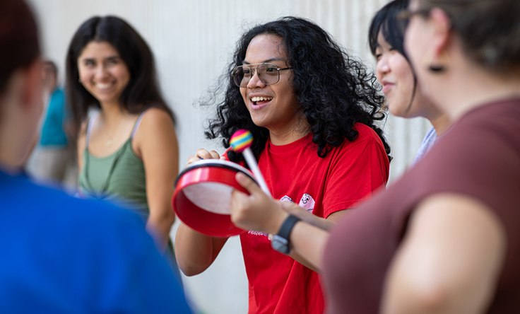 Student Playing Music
