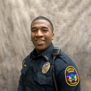 Headshot profile of Jamal Combs