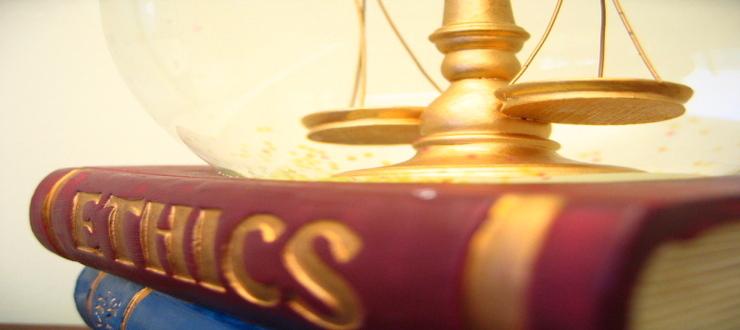 ethics book and globe